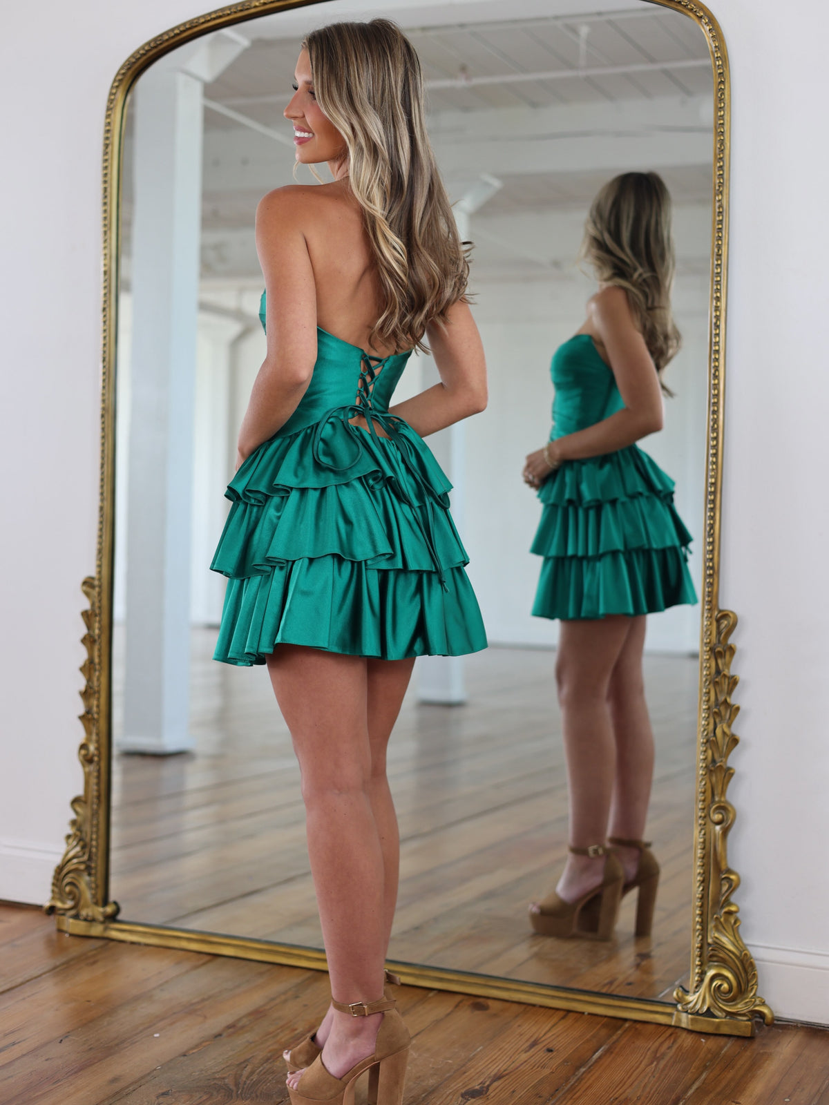 Emerald green cutout strapless tiered ruffle mini homecoming dress - back view lace-up