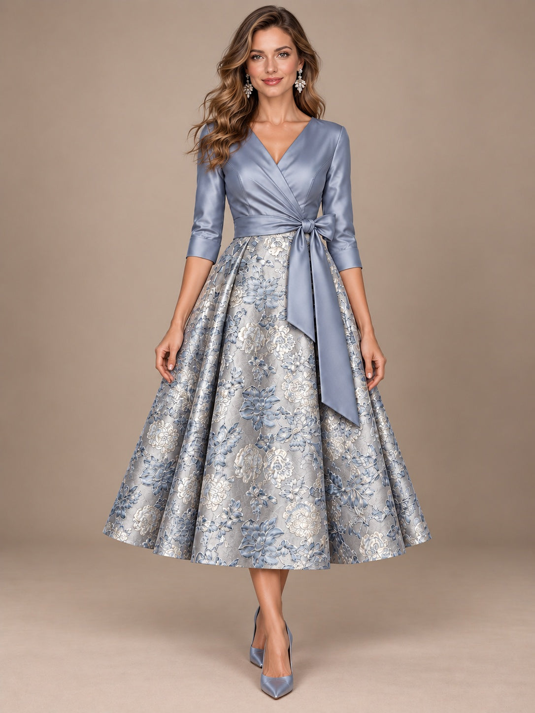 Dusty blue floral jacquard mother of the bride midi dress with V-neck, 3/4 sleeves and tie waist